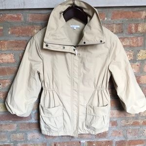 Vince windbreaker utility cinched waist jacket in beige with 3/4 sleeves.